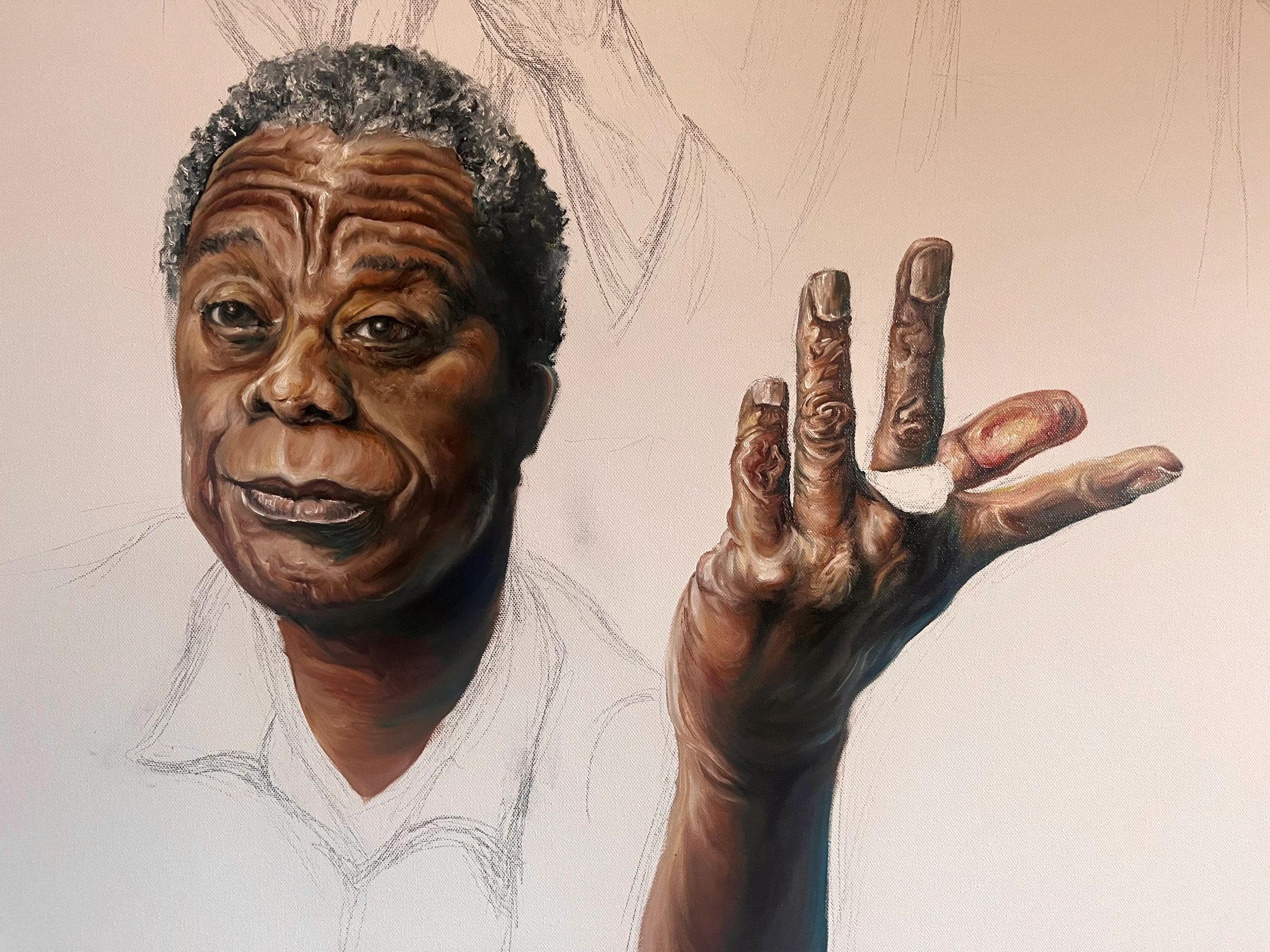 Unfinished, James Baldwin painting in progress welcoming viewer with his hand and sketch around him.