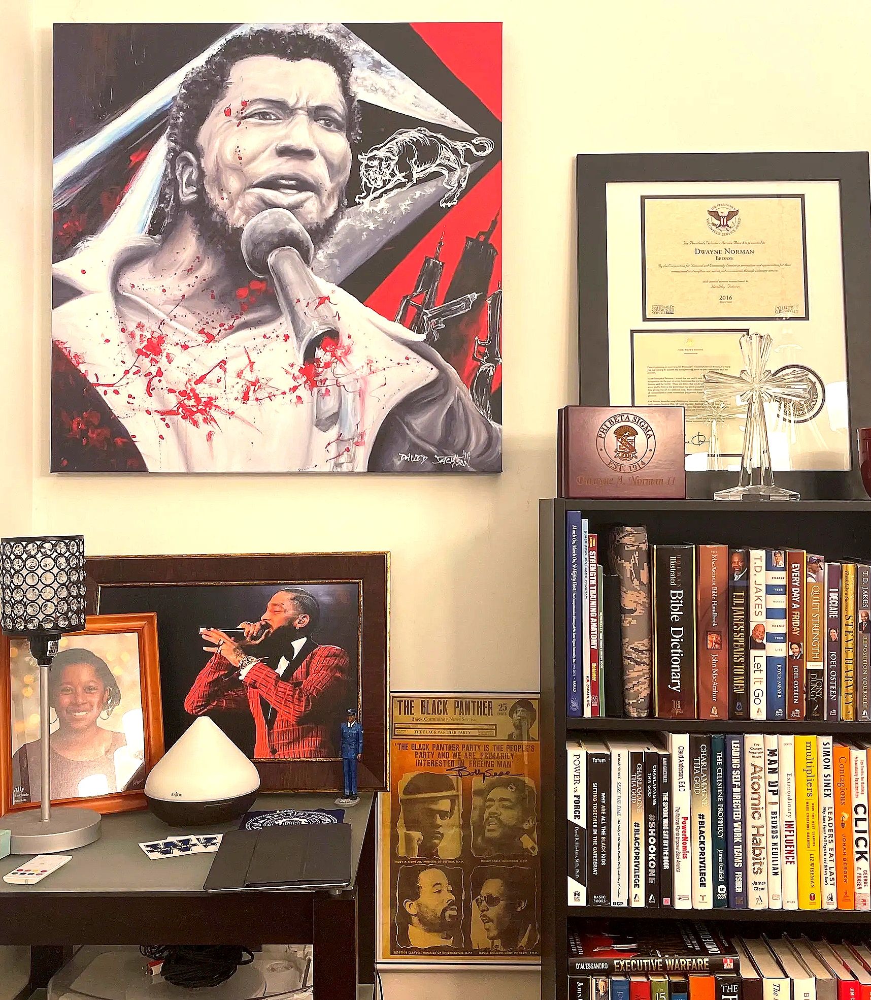 Fred Hampton painting displayed on wall