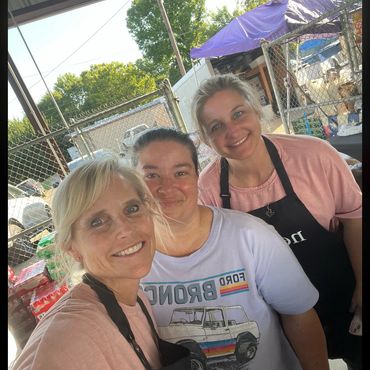 group of people serving dirty sodas at an event in Burleson County Tx