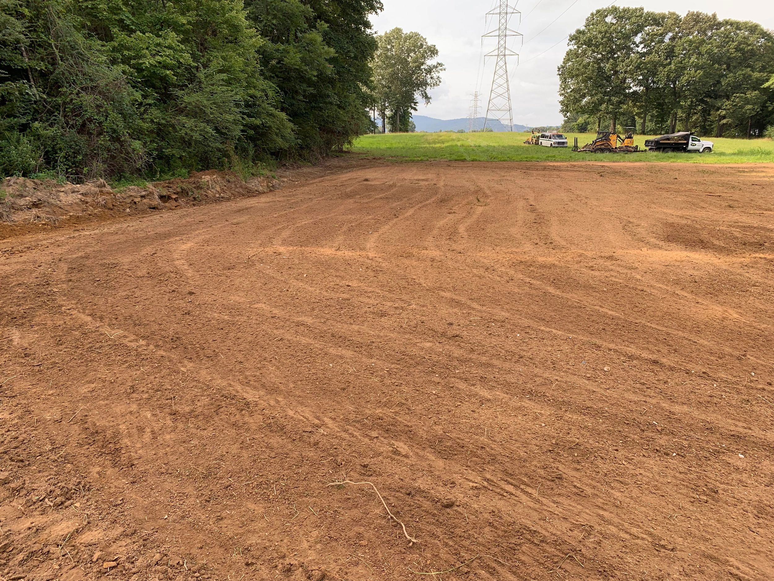 Clearing, cleaning and leveling ground.