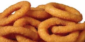 A pile of golden, crispy onion rings.