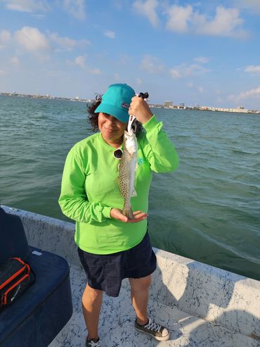 Woman Holding Speckled Trout