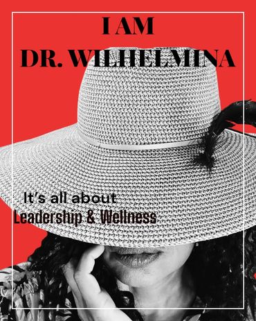 Woman in a large hat with text about Dr. Wilhelmina and leadership.