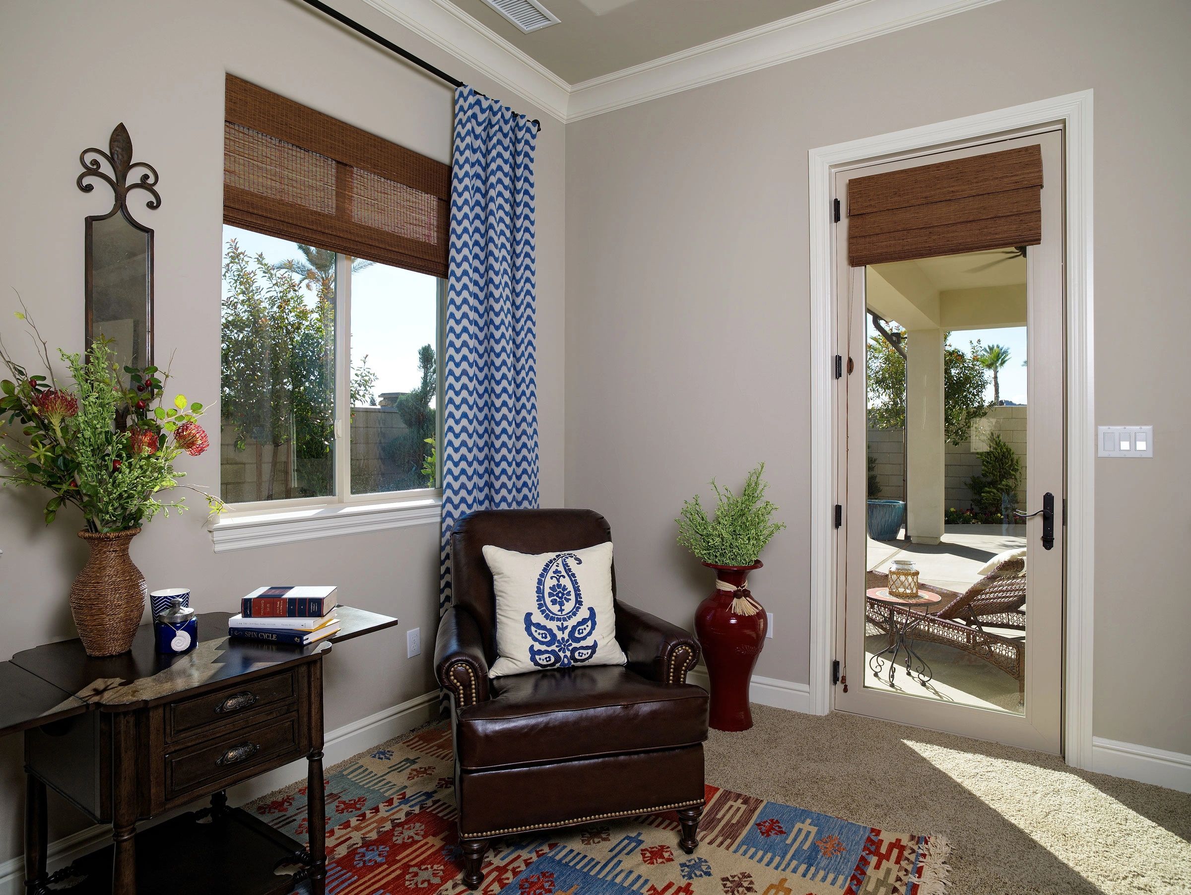 Picture of a single panel Malibu swing french door and Anlin window installed in a home.