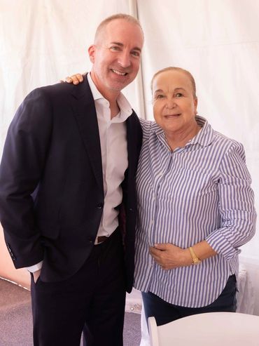 Ian McGaughey visiting with San Luis Mayor Nieves Riedel