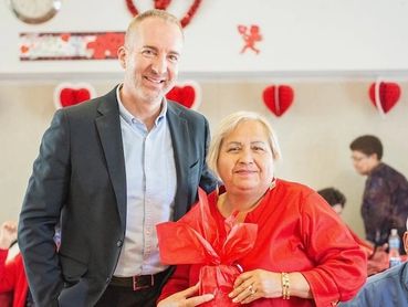 Ian McGaughey visiting a senior center on Valentine's Day