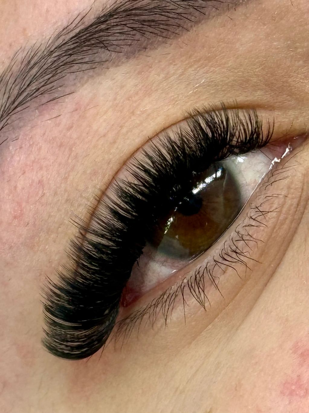 Close-up photo of a custom volume lash set created at Vici Esthetics in Marrero, LA