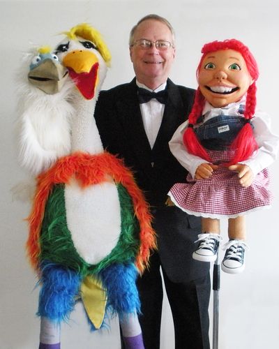 Dana and his puppet friends.