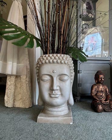 Buddha head planter.