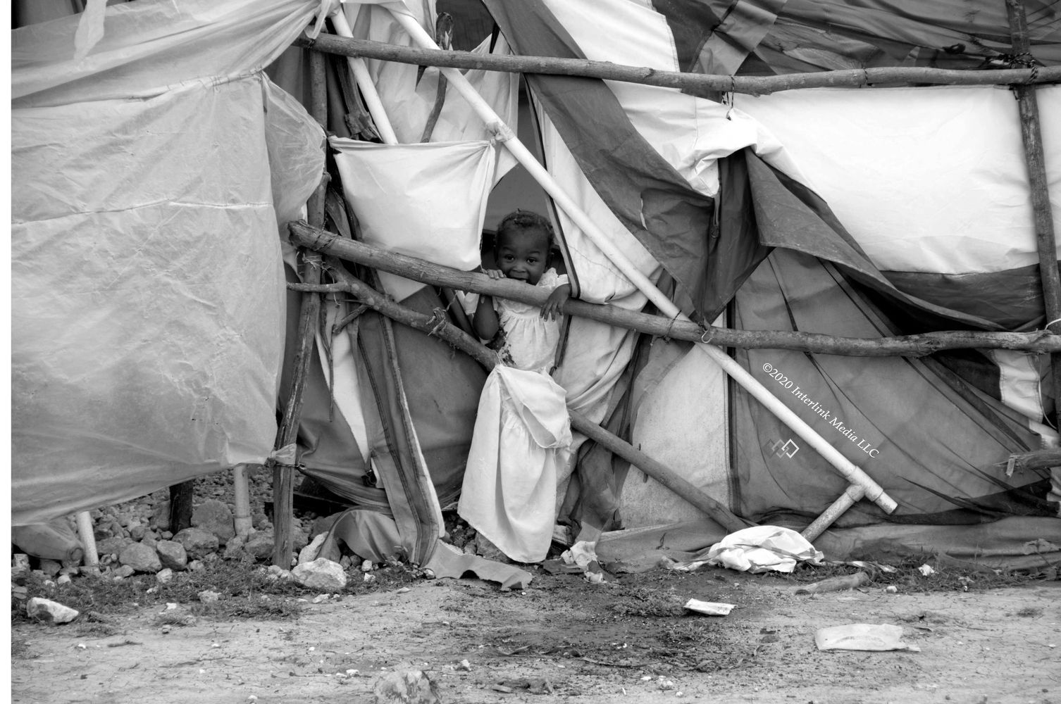 A small girl in a tent in Haiti immediately after the massive earthquake in 2010.