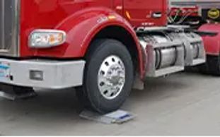 Static portable wheel load scales offer precise weight measurements.