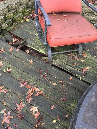 Observed at time of inspection holes in several areas of deck, recommend licensed contractor inspect