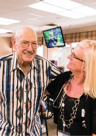 An elderly man and a woman