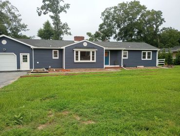 Beautiful Rancher with new garage addition and new siding.