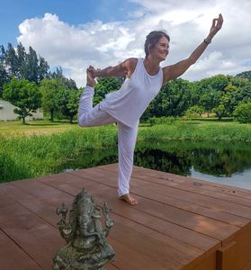Yoga instructor dancer pose costa rica