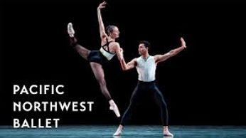 Ballet dancer leaps with her partner