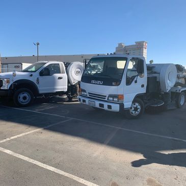 Parking lot sweepers.
