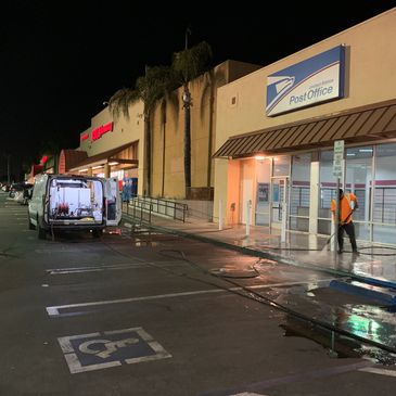 Storefront power washing services.