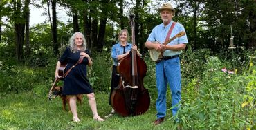 Ma Crow, Dale Farmer, Wendy Muncy, The Farmer and The Crow, standing in a meadow