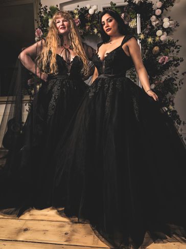 Hannah Black models wearing the Zephyr black ballgown wedding dress.