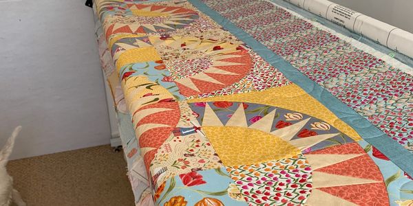 Loaded on the longarm for quilting
