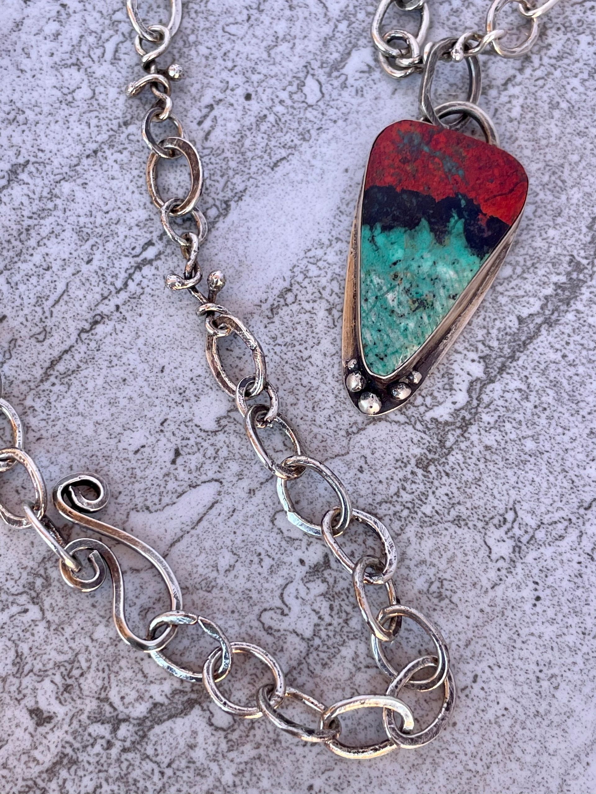 Sonoran sunset stone set in sterling silver with completed hand wrought chain. 