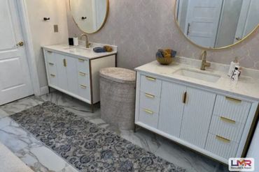 Bathroom remodel with white vanity cabinets Fort Myers