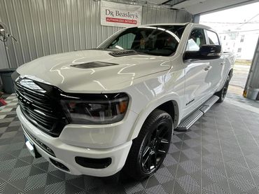 Ram 1500 Decontaminated from dirt and debris. Protected with a 1 year coating.