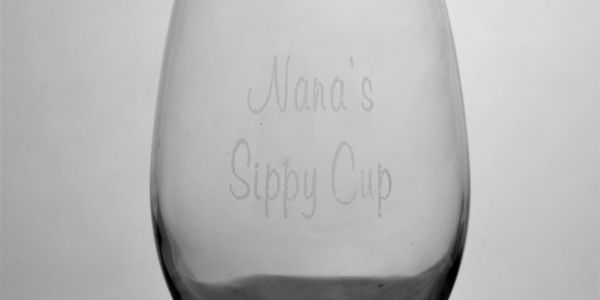 Stemless wine glass laser etched wit "Nana's Sippy Cup"