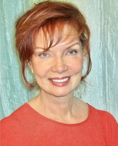 Marilyn Vega, a Woman smiling