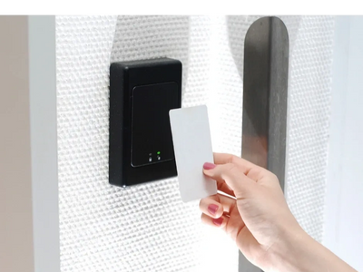 A man using Wireless Locks  Card Access