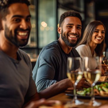 Group of people smiling and eating