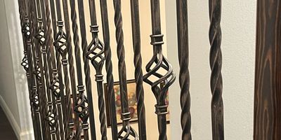 Wrought-iron balustrade that was part of a stair remodel in Thornton