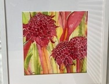 Vibrant red flowers painting with green and pink background.