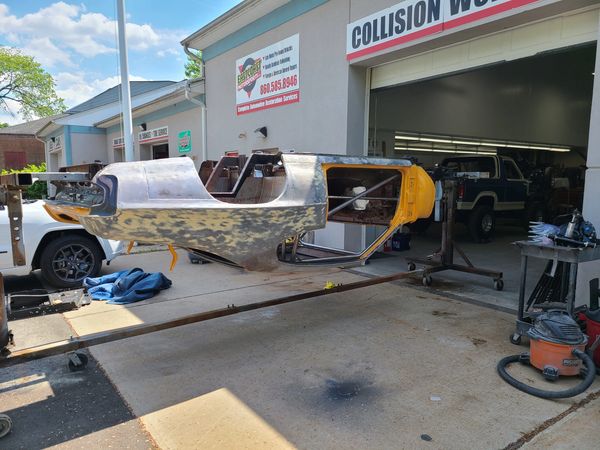 A 1970 Pontiac GTO Car Restoration Project on a rotisserie
