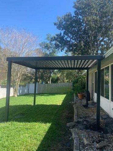 ATTACHED TO WALL ALUMINUM PERGOLA.