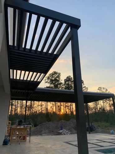 ATTACHED TO WALL ALUMINUM PERGOLA.