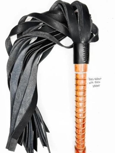 Black leather flogger with a wooden handle.