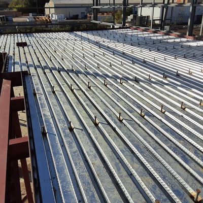 Steel decking with welded steel bars on a construction site.