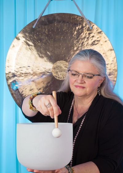 Jan Coe with gong and singing bowl