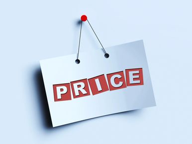 A sign with the word "PRICE" hanging on a red pin.