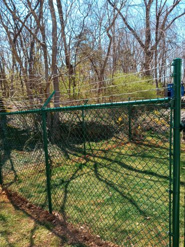 6' Green Chain Link with 3 Strands of Barbed Wire on Top