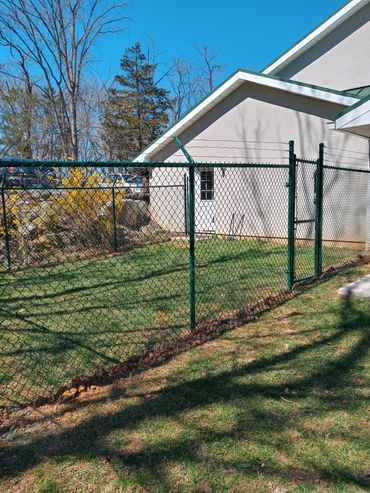 6' Green Chain Link with 3 Strands of Barbed Wire on Top