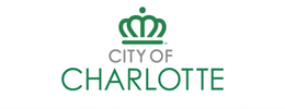 Logo of the City of Charlotte with a green crown above the text.