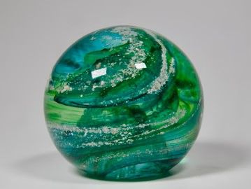 Cremation Ashes set inside handmade/blown crystal round paperweight