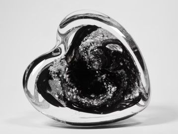 Cremation Ashes set inside handmade/blown Crystal Step Heart paperweight.