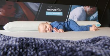 Baby sleeping on a Tempur-Pedic ProBreeze Mattress