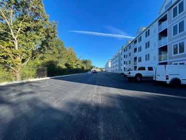 40,000 sq ft parking lot, regrade and apply base coat