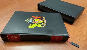 Premium book slipcase paired with leather binding for secure storage.