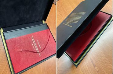 High-end presentation case with protective enclosure and tailored insert.